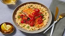 Steelhead Trout over Basil Parm Risotto with Burst Tomatoes Steelhead Trout over Basil Parm Risotto with Burst Tomatoes
