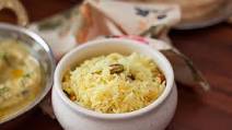 Bengali Holud Mishti Pulao Recipe - Saffron Flavored Rice With Nuts Bengali Holud Mishti Pulao Recipe - Saffron Flavored Rice With Nuts