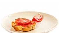 Tostada con aceite y tomate Tostada con aceite y tomate