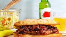 Chicago-style pork blade sandwiches with caramelized onion and coleslaw Chicago-style pork blade sandwiches with caramelized onion and coleslaw