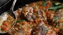 Cajun-Smothered Pork Medallions Cajun-Smothered Pork Medallions