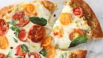 Pesto Pizza with Fresh Tomatoes and Mozzarella Pesto Pizza with Fresh Tomatoes and Mozzarella