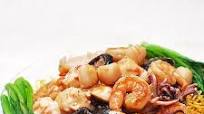 Crispy Pan-Fried Noodle Cakes With Seafood Recipe Crispy Pan-Fried Noodle Cakes With Seafood Recipe
