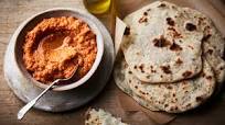 Carrot hummus with garlic and herb flatbreads Carrot hummus with garlic and herb flatbreads
