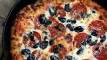 Pizzeria-style deep dish pizza Pizzeria-style deep dish pizza