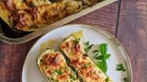 Recipe for Stuffed Zucchini Boats With Ground Beef and Bechamel Sauce On Top Recipe for Stuffed Zucchini Boats With Ground Beef and Bechamel Sauce On Top