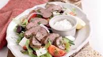 Minted lamb with Greek salad and tzatziki Minted lamb with Greek salad and tzatziki