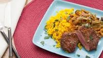 Minute Steaks with Picadillo-Style Sauce & Yellow Rice Minute Steaks with Picadillo-Style Sauce & Yellow Rice