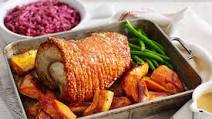 Roast pork with braised cabbage, cider and apple Roast pork with braised cabbage, cider and apple