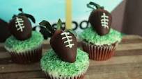 Chocolate Cupcakes with Coconut Grass and Chocolate Covered Strawberry Footballs Chocolate Cupcakes with Coconut Grass and Chocolate Covered Strawberry Footballs