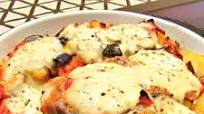 Roasted pork chops with aubergines, potatoes and mozzarella Roasted pork chops with aubergines, potatoes and mozzarella