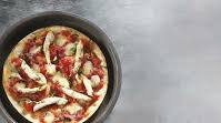 pita pizza with tomato, pork bacon and arugula pita pizza with tomato, pork bacon and arugula