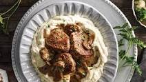 Pork with Mushrooms and Brie Sauce Over Mashed Potatoes Pork with Mushrooms and Brie Sauce Over Mashed Potatoes