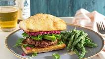 Impossible Burger with avocado, watercress, and cashew-beet spread Impossible Burger with avocado, watercress, and cashew-beet spread