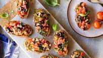 Bruschettas com tomate e manjericão Bruschettas com tomate e manjericão