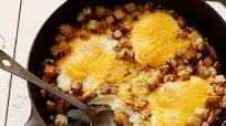 Baked Eggs with Farmhouse Cheddar and Potatoes Baked Eggs with Farmhouse Cheddar and Potatoes