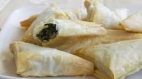 Spanakopita (spinach and feta triangles) Spanakopita (spinach and feta triangles)