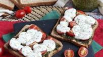 Tomato, mozzarella and pesto bruschetta Tomato, mozzarella and pesto bruschetta