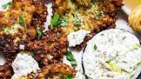 Mediterranean-Style Zucchini Fritters with Tzatziki Dipping Sauce Mediterranean-Style Zucchini Fritters with Tzatziki Dipping Sauce