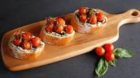 Blistered Tomato Ricotta Crostini Blistered Tomato Ricotta Crostini