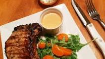 Deviled Pork Chops with Arugula & Mandarins Deviled Pork Chops with Arugula & Mandarins