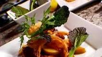 Grilled Pork Chops with Sauteed Apples, Onion Rings and Mustard Greens Grilled Pork Chops with Sauteed Apples, Onion Rings and Mustard Greens