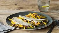 Smoky Adobo Chicken Tacos with Mango Slaw & Lime Crema Smoky Adobo Chicken Tacos with Mango Slaw & Lime Crema