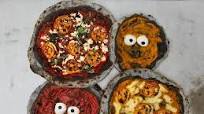 Halloween Pizzas with Charcoal Activated Dough Halloween Pizzas with Charcoal Activated Dough