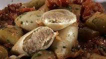 Sausage-stuffed squid braised with tomatoes and potatoes Recipe Sausage-stuffed squid braised with tomatoes and potatoes Recipe