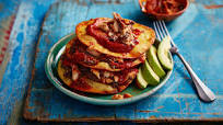 Sardines in tortillas with spicy tomato sauce and refried beans Sardines in tortillas with spicy tomato sauce and refried beans