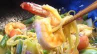 Pancit Canton - Chinese Noodles Stir-fried with Vegetables and Shrimps Pancit Canton - Chinese Noodles Stir-fried with Vegetables and Shrimps