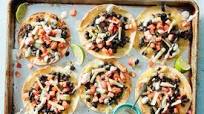 Crispy Nacho Tostadas with Black Beans & Lime Crema Crispy Nacho Tostadas with Black Beans & Lime Crema