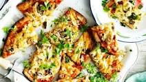 Chicken and mushroom pizzas Chicken and mushroom pizzas