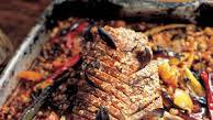 Slow-roasted spiced pork loin with black-eyed beans and tomatoes Slow-roasted spiced pork loin with black-eyed beans and tomatoes