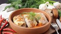 Delicious Risotto-Stuffed Cabbage Parcels in Tomato Sauce Recipe Delicious Risotto-Stuffed Cabbage Parcels in Tomato Sauce Recipe