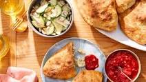 Cheesy Pesto Chicken Calzones with Tomato Sauce & Marinated Zucchini Cheesy Pesto Chicken Calzones with Tomato Sauce & Marinated Zucchini