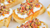 Burrata Crostini with Kalamata Olive Tapenade Burrata Crostini with Kalamata Olive Tapenade
