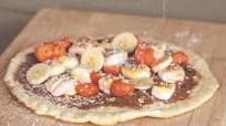 Chocolate pizza with marshmallows and fruit Chocolate pizza with marshmallows and fruit