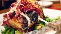 Tomas Curi's Crispy Braised Mangalitsa Belly with Bitter Greens and Citrus Tomas Curi's Crispy Braised Mangalitsa Belly with Bitter Greens and Citrus