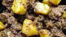 Slow-cooked Indian beef and potato curry. Slow-cooked Indian beef and potato curry.
