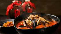 Korean spicy noodle soup with seafood Korean spicy noodle soup with seafood