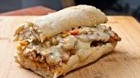 Shaved BBQ pork sirloin sandwich with smoked Gouda and garlic aioli Shaved BBQ pork sirloin sandwich with smoked Gouda and garlic aioli
