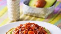 Tostadas de pulpo en mole amarillo Tostadas de pulpo en mole amarillo