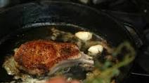 Kurobuta pork chops with white bean puree, ham hock jus and salsa verde Recipe Kurobuta pork chops with white bean puree, ham hock jus and salsa verde Recipe