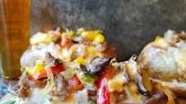 Twice Baked Philly Cheesesteak Potatoes with Homemade Whiz Twice Baked Philly Cheesesteak Potatoes with Homemade Whiz