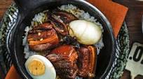 Soy-braised pork belly with marbled eggs Soy-braised pork belly with marbled eggs