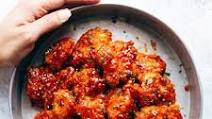 Sticky Baked Chicken Bites in Honey Sriracha Sauce Sticky Baked Chicken Bites in Honey Sriracha Sauce