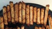 Sigara Boregi - Cigar shaped pastry stuffed with white cheese Sigara Boregi - Cigar shaped pastry stuffed with white cheese