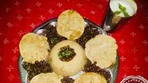 Navratri special thali (dry kala chana,suji halwa,puri, Charnamrit Navratri special thali (dry kala chana,suji halwa,puri, Charnamrit