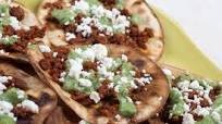 Tostadas With Chorizo, Tangy Guacamole and Fresh Cheese Tostadas With Chorizo, Tangy Guacamole and Fresh Cheese
